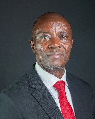 John K. Arap Lagat, Director and General Manager